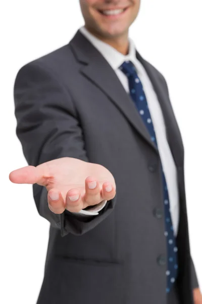 Businessman showing his empty hand — Stock Photo, Image