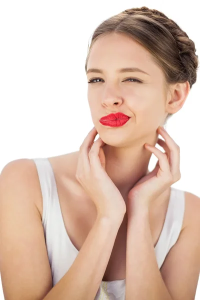 Charming model in white dress posing wrinking her nose — Stock Photo, Image