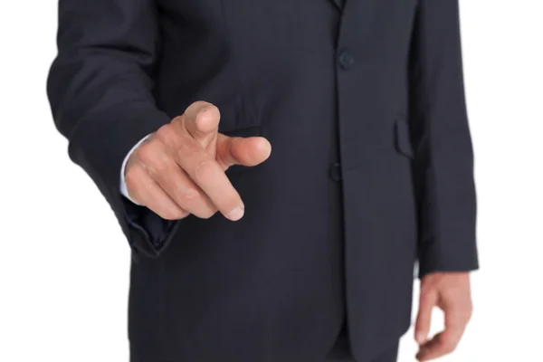 Businessman pointing finger at camera — Stock Photo, Image