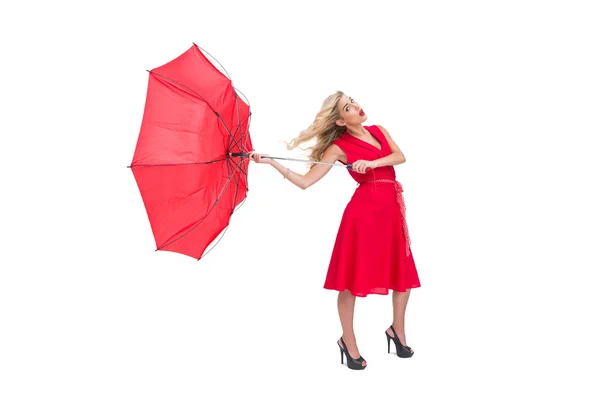 Attractive glamour woman holding a broken umbrella — Stock Photo, Image