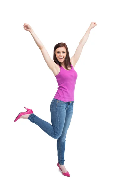 Happy stylish brunette wearing high shoes cheering up — Stock Photo, Image