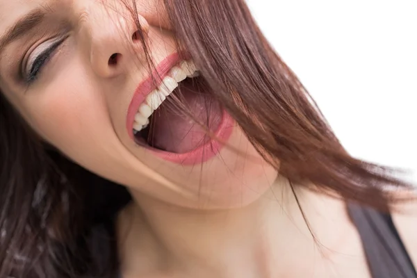 Close up on pretty brunette screaming — Stock Photo, Image