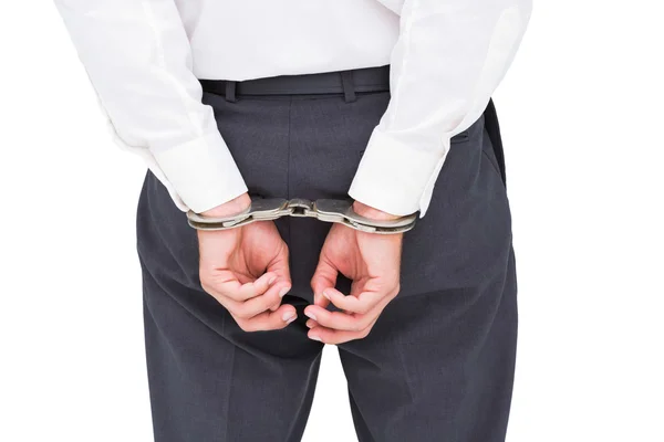 Close up on classy businessman wearing handcuffs — Stock Photo, Image