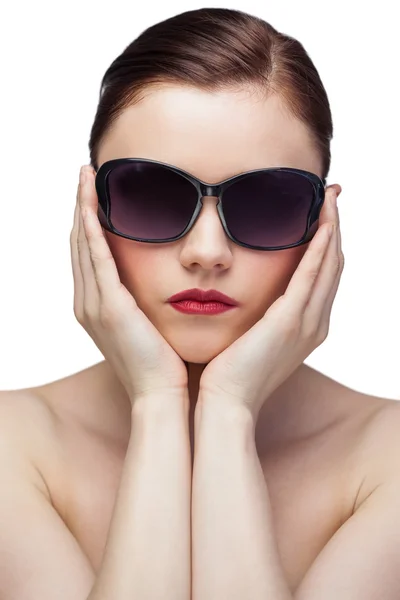 Serious young model wearing stylish sunglasses — Stock Photo, Image