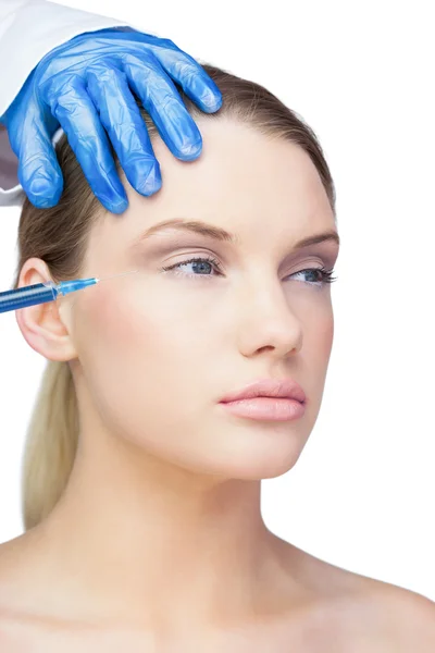 Calm young model having botox injection — Stock Photo, Image