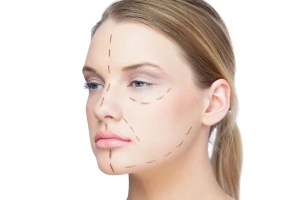 Pretty blonde woman with dotted lines on the face — Stock Photo, Image