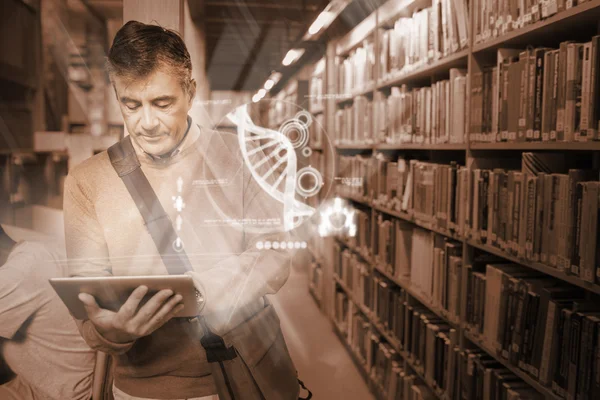 Mature student using futuristic hologram to learn biology from his tablet — Stock Photo, Image