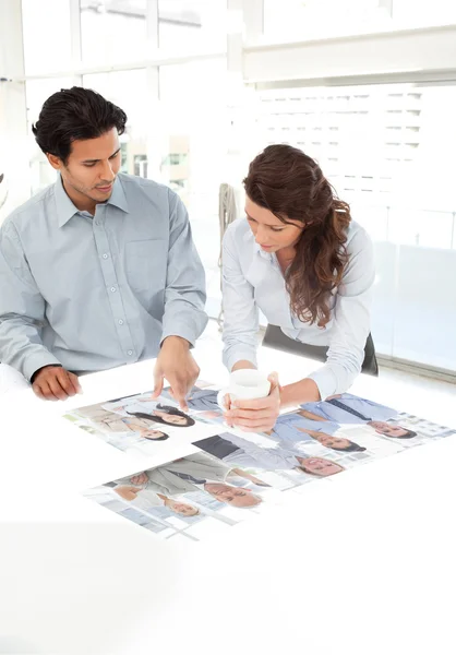 Young colleagues working together using digital interface — Stock Photo, Image