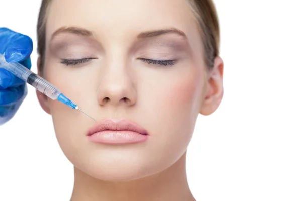 Relaxed beautiful model having botox injection above the lips — Stock Photo, Image