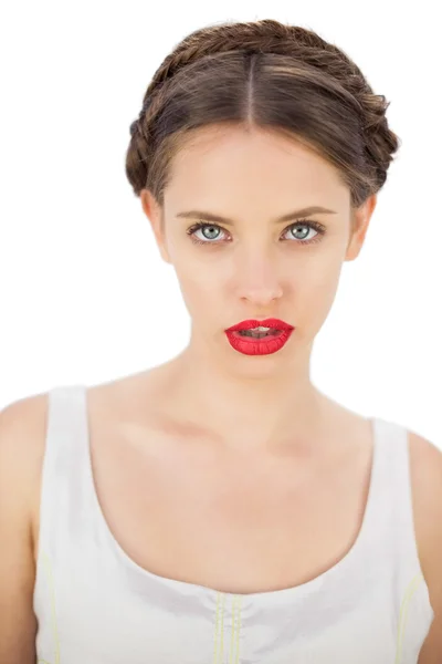 Calm model in white dress posing looking at camera — Stock Photo, Image