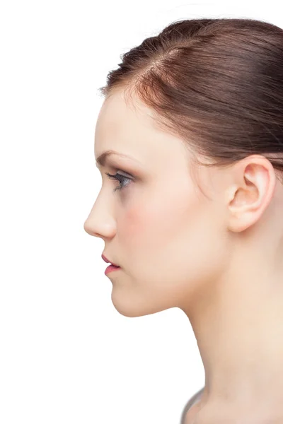 Profile view of serious fresh brunette posing — Stock Photo, Image