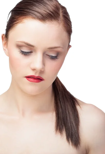 Pensive gorgeous model with ponytail posing — Stock Photo, Image