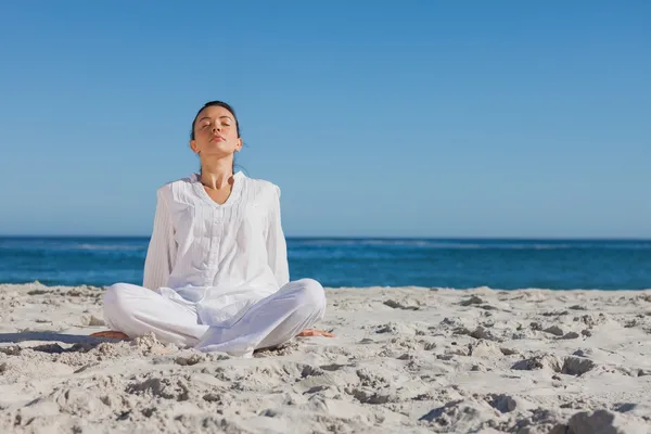 Peaceful woman sitting and relaxing — Stock Photo, Image