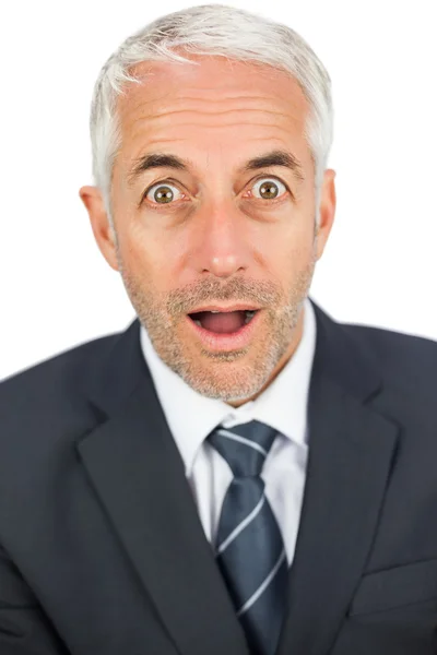 Shocked businessman looking at camera — Stock Photo, Image