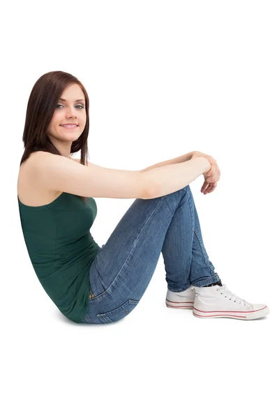 Cheerful attractive brunette sitting — Stock Photo, Image