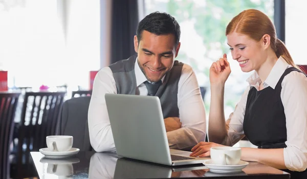 Happy business team working together in a cafe — Stock Photo, Image