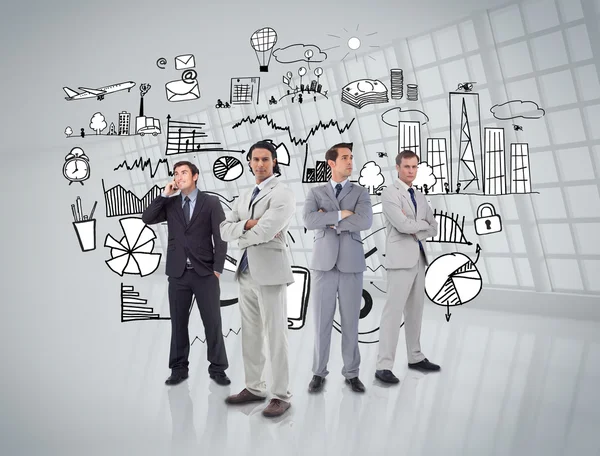 Business people standing in front of graphics — Stock Photo, Image