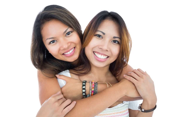 Two pretty sisters posing in front of the camera — Stock Photo, Image