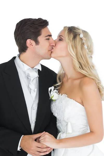 Young married couple posing kissing each other — Stock Photo, Image