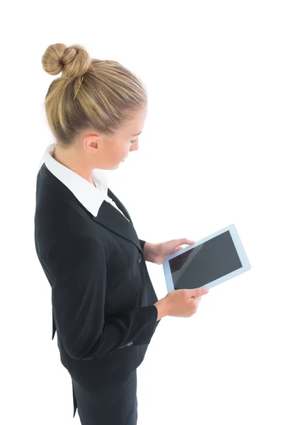 High angle profile view of young businesswoman using her tablet — Stock Photo, Image