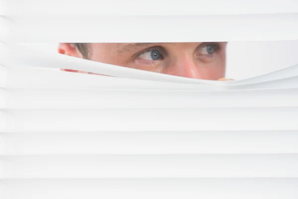 Male eyes spying — Stock Photo, Image