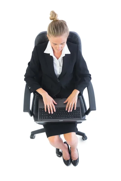 Focused young businesswoman using her notebook — Stock Photo, Image