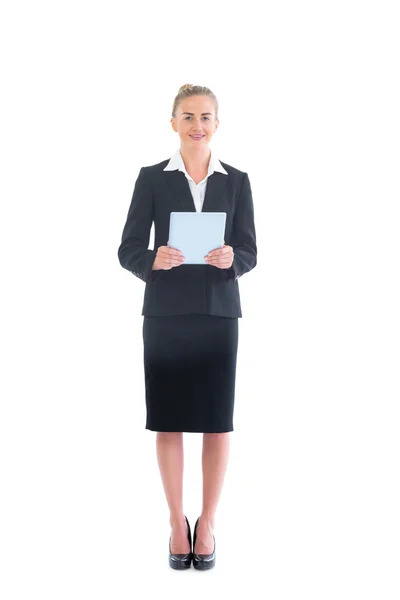 Pretty young businesswoman holding her tablet — Stock Photo, Image