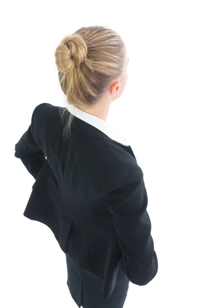 Visão traseira de alto ângulo de atraente loira empresária posando — Fotografia de Stock