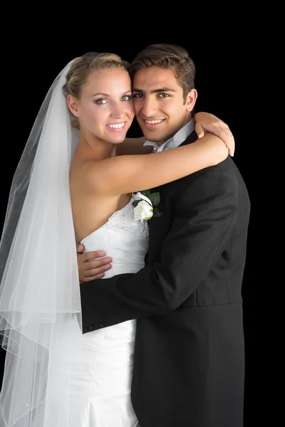 Beautiful bride hugging her husband — Stock Photo, Image