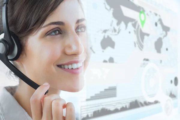 Cheerful call center employee using futuristic interface hologram — Stock Photo, Image