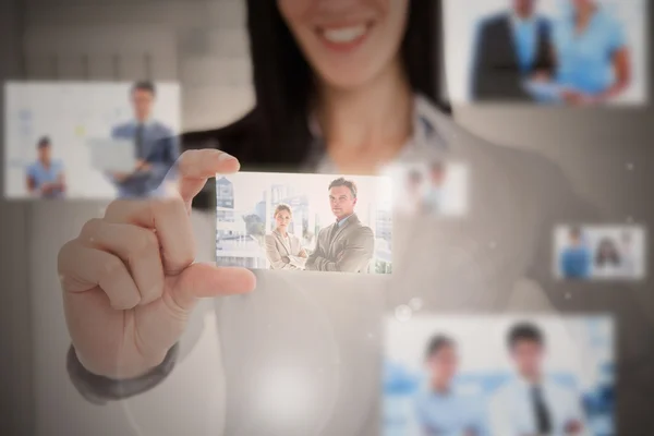 Businesswoman using futuristic interface — Stock Photo, Image