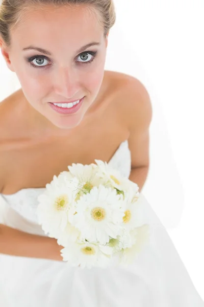 High angle view of cute bride holding a bouquet — Stock Photo, Image