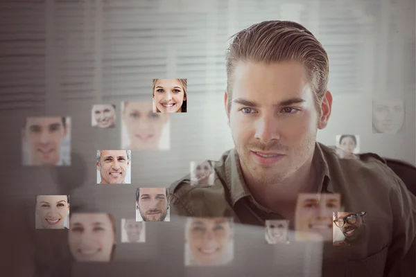 Handsome man encircled by digital interface — Stock Photo, Image