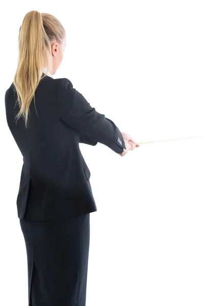 Blonde ponytailed business woman pulling a rope — Stock Photo, Image