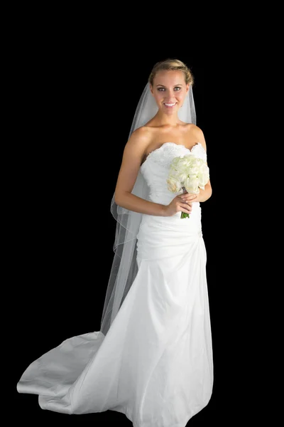 Magnifique jeune mariée posant tenant un bourquet — Photo