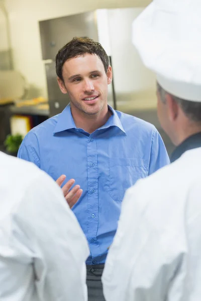 Young manager talking to the staff — Stock Photo, Image