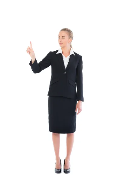 Young blonde business woman pointing Stock Photo