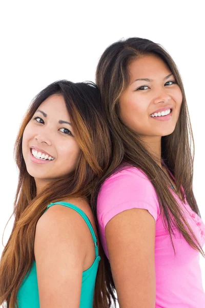 Two beautiful girls posing for the camera Stock Image