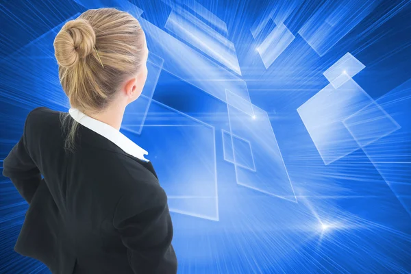 Businesswoman standing with hands on hips — Stock Photo, Image