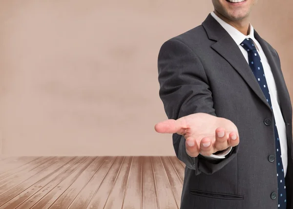 Businessman showing his empty hand — Stock Photo, Image