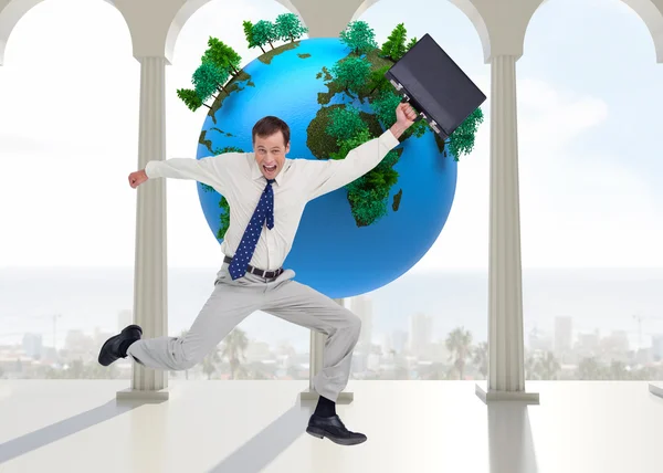 Cheerful jumping businessman with his suitcase — Stock Photo, Image