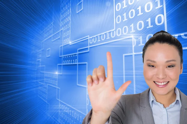 Compuesto imagen de sonriente asiática mujer de negocios señalando — Foto de Stock