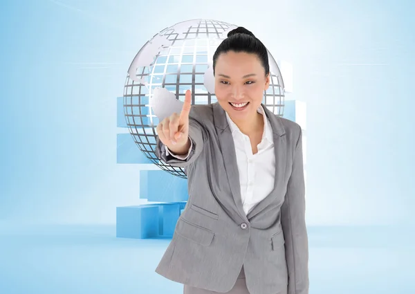 Smiling asian businesswoman pointing — Stock Photo, Image