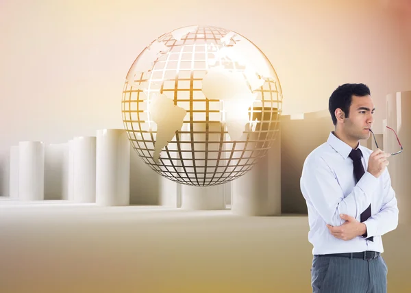 Composite image of unsmiling businessman holding glasses — Stock Photo, Image