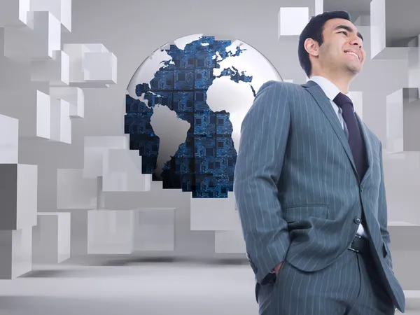 Imagen compuesta del hombre de negocios sonriente de pie — Foto de Stock