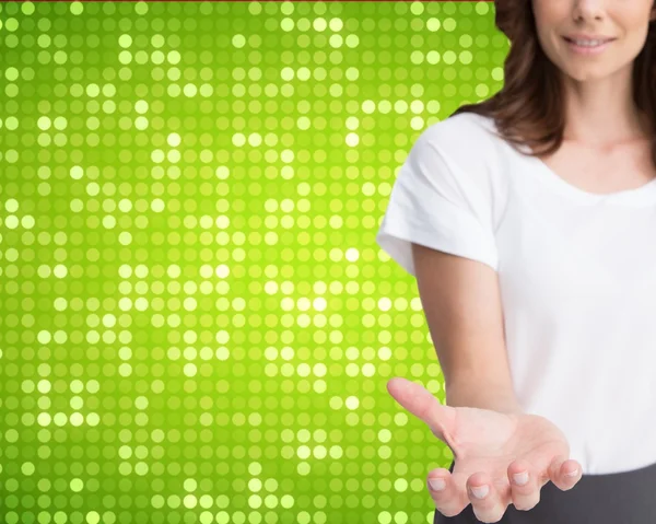 Businesswoman presenting her empty hand — Stock Photo, Image