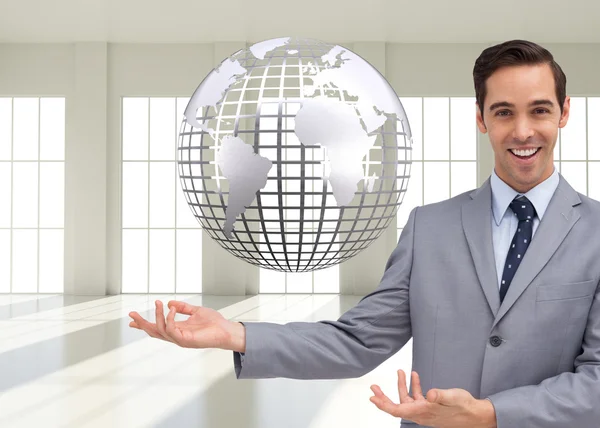 Young businessman presenting something — Stock Photo, Image