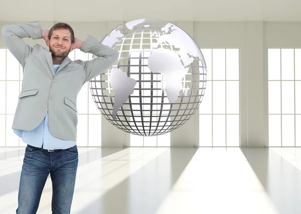 Suave man in a blazer with hands behind head — Stock Photo, Image