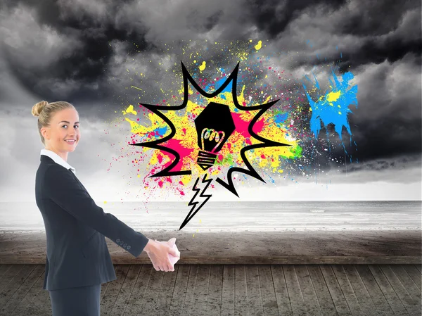 Composite image of happy businesswoman looking at camera — Stock Photo, Image