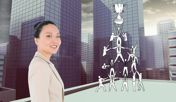 笑みを浮かべてアジア女性実業家の合成画像 — ストック写真
